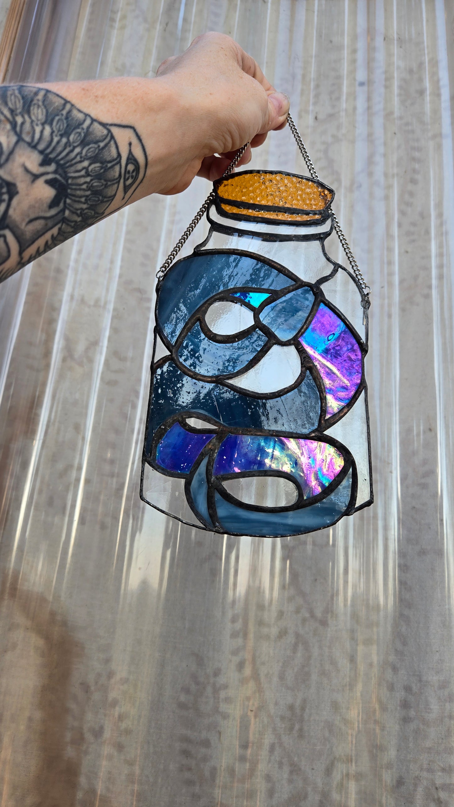 Irridescent Snake in a Jar Potion Bottle