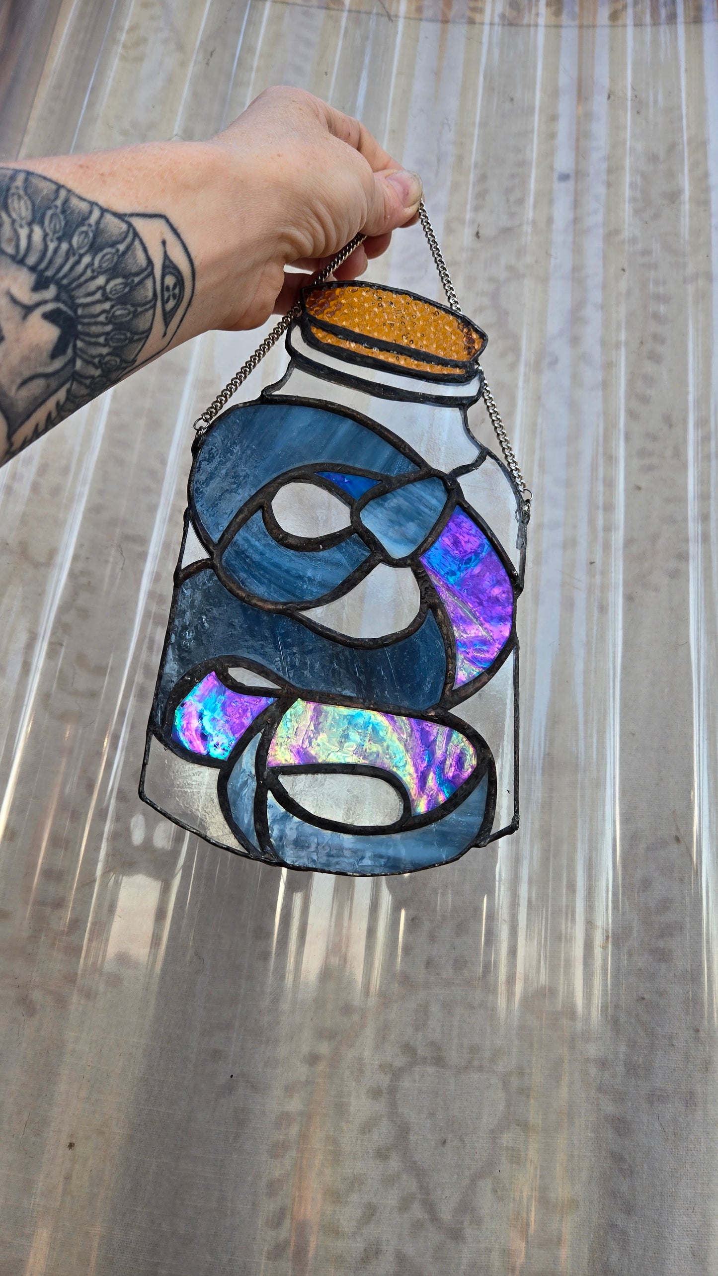 Irridescent Snake in a Jar Potion Bottle